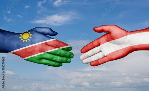 Austria and Namibia country handshaking with flags, consensus concept international co-operation illustration