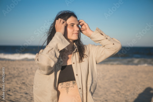 Portrait of a very happy young woman loving the life shes living having fun on the beach