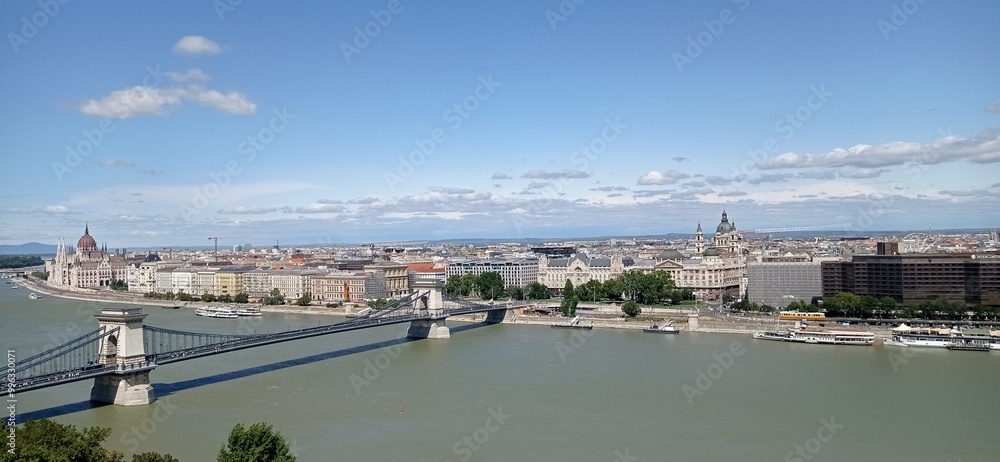 Budapest city. View at Chain bridge, river Danube and famous building of Parliament. Budapest city. View at Chain bridge, river Danube and famous building of Parliament.