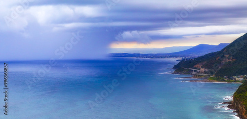 Panorama view of a rain squall approaching the Illawarra Coast including Sea Cliff Bridge.