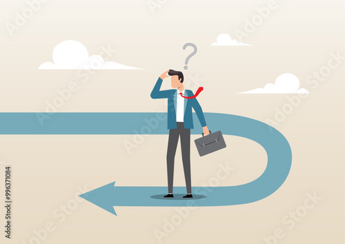 frustrated businessman investor looking at his reverse direction pathway