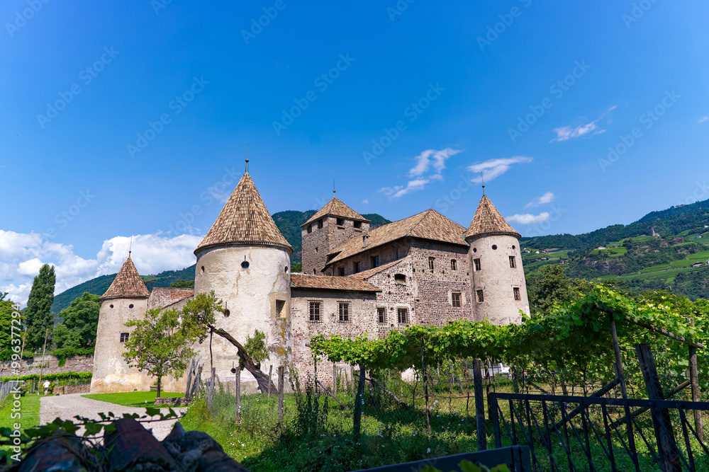 Obraz premium Scenic view of medieval castle named Maretsch Mareccio at Italian City of Bozen on a sunny summer day. Photo taken July 17th, 2024, Bolzano Bozen, Italy.