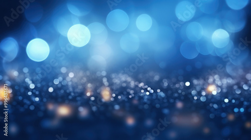 Blur bookeh silver lights or flashes on a dark blue color background