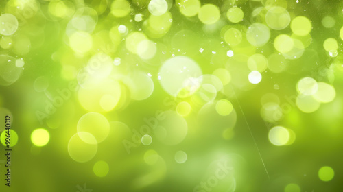 Blur bookeh silver lights or flashes on a vivid lime color background