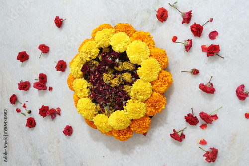 colorful flowers stacked up to create bathukamma, a specific hindu god worshiped in south india photo