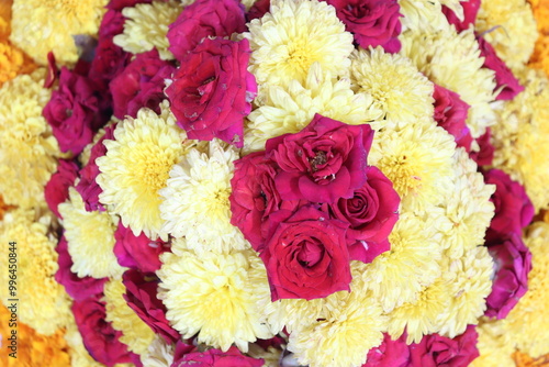 colorful flowers stacked up to create bathukamma, a specific hindu god worshiped in south india photo