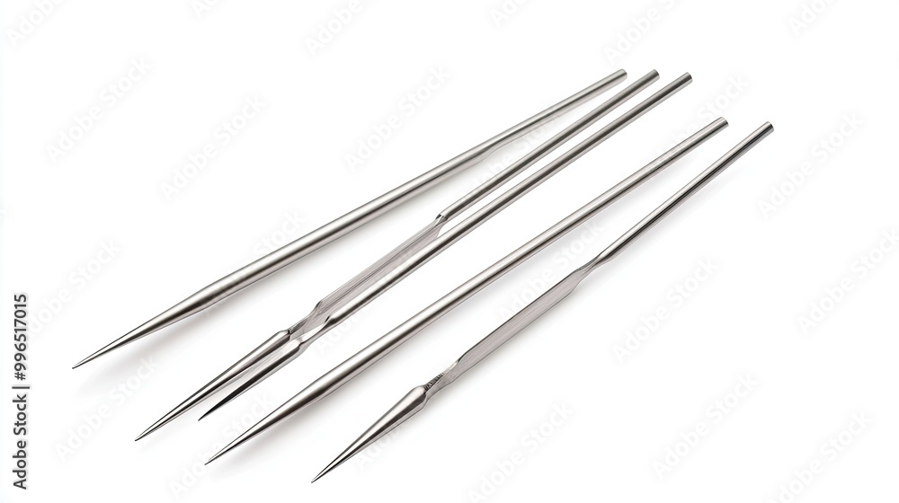 A collection of metal dental tools, perfect for precision work in dentistry or laboratory settings. A collection of metal dental tools, perfect for precision work in dentistry or laboratory settings.