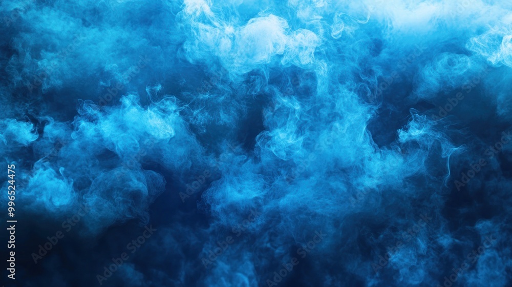 Fototapeta premium A mesmerizing display of blue smoke swirling through the air, creating a dynamic and ethereal atmosphere.