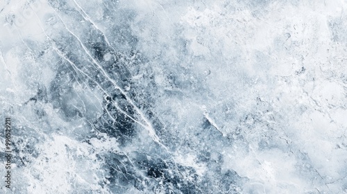 Close-up of a textured icy surface with shades of blue and white, evoking a serene winter mood.