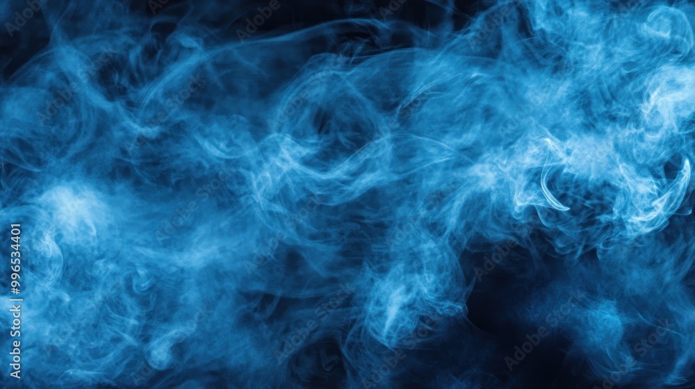 Blue smoke swirls gracefully against a dark background, creating an ethereal atmosphere. Blue smoke swirls gracefully against a dark background, creating an ethereal atmosphere.