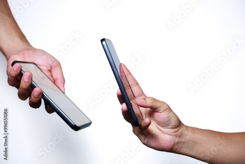 Hand holding smartphone on white background. QR code payment concept. Digital money payment.