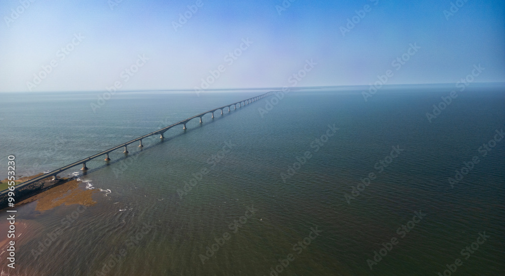 Obraz premium Confederation Bridge (French: Pont de la Confédération) is a box girder bridge carrying the Trans-Canada Highway across the Abegweit Passage of the Northumberland Strait, aerial view