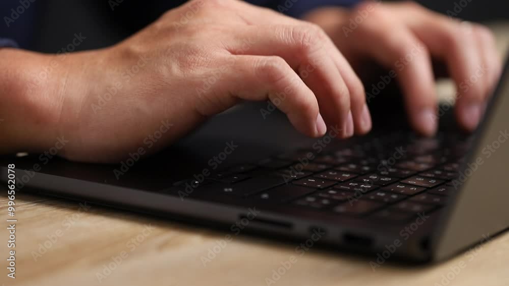 Close up shot user or developer using laptop and typing on keyboard Close up shot user or developer using laptop and typing on keyboard