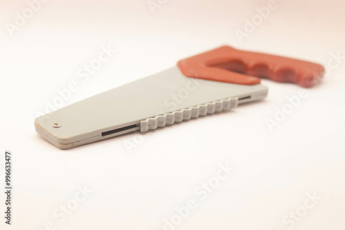 Wallpaper Mural Toy saw on white background Torontodigital.ca