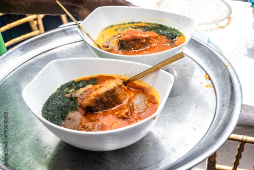 Grilled party croaker fish served with amala mixed with ewedu and gbegiri soup for guest at a birthday party in LagosParty photo