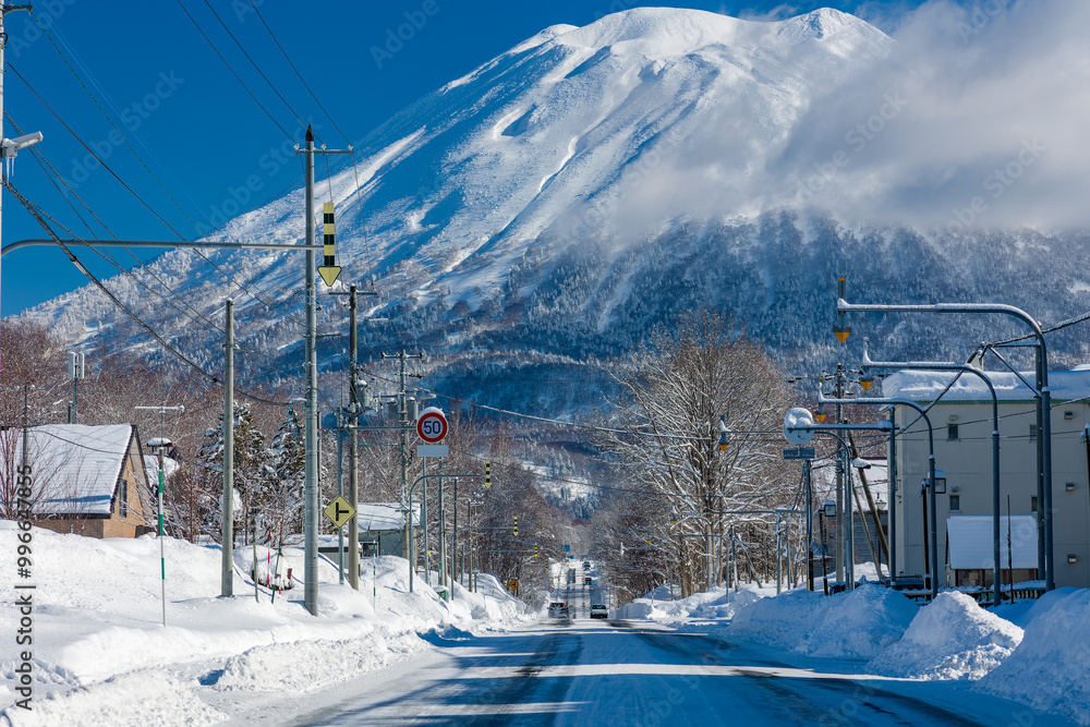 Snowy roads leading to a huge, snow covered volcano (Niseko and Mount Yotei, Hokkaido)