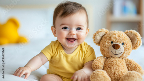a baby smiling with a plush toy