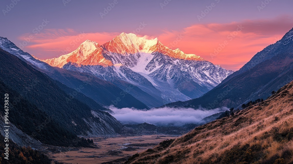 Sunrise over majestic snow-capped mountains in a tranquil valley surrounded by lush greenery and dramatic cliffs at dawn Sunrise over majestic snow-capped mountains in a tranquil valley surrounded by lush greenery and dramatic cliffs at dawn