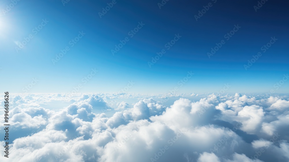Aerial perspective showcasing a vast spread of fluffy white clouds beneath a clear blue sky highlighting the serene beauty of high altitude views Aerial perspective showcasing a vast spread of fluffy white clouds beneath a clear blue sky highlighting the serene beauty of high altitude views