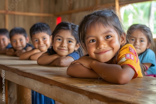 children smiles in the classroom full with wooden tables