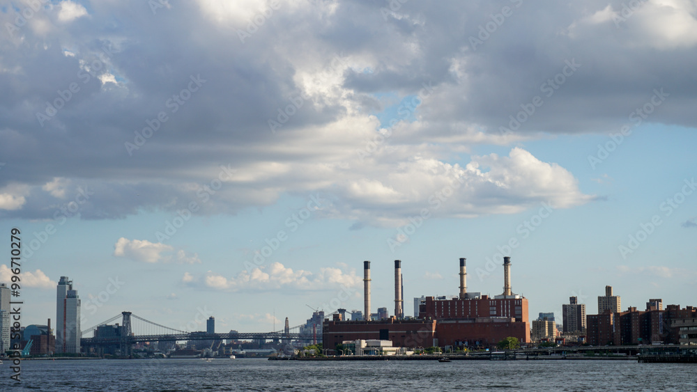 A view of Brooklyn and the Williamsburg Bridge on a cloudy day A view of Brooklyn and the Williamsburg Bridge on a cloudy day