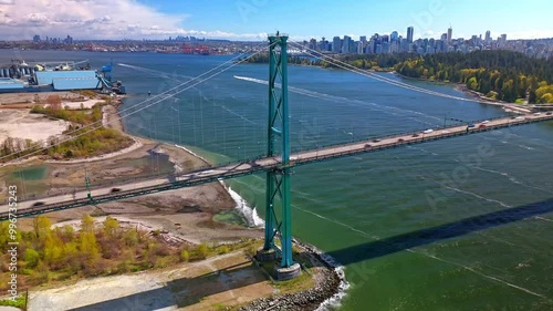hyper lapse of aerial view over the river and the bridge near lions gate in Vancouver