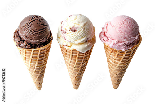 Three scoops of chocolate, vanilla, and strawberry ice cream in waffle cones, isolated on a black background.