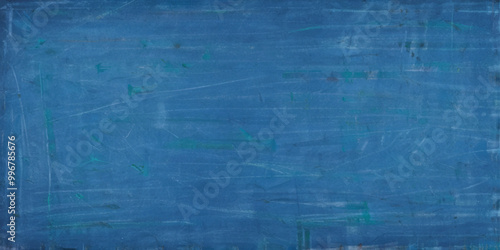 Texture of blue chalkboard with copy space. Education and reading concept background.