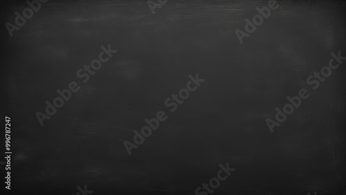 A blank black chalkboard surface, ready for writing or drawing.