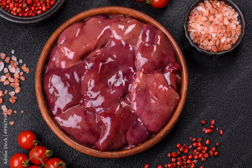 Fresh raw chicken or beef liver with salt, spices and herbs Fresh raw chicken or beef liver with salt, spices and herbs