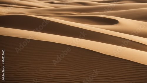 Brown sand dunes with ridged texture and valleys. photo