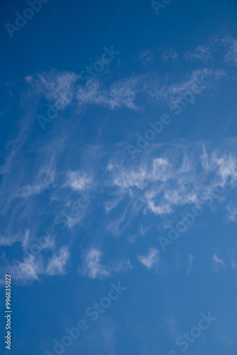 Sky. Blue sky with a few clouds background.