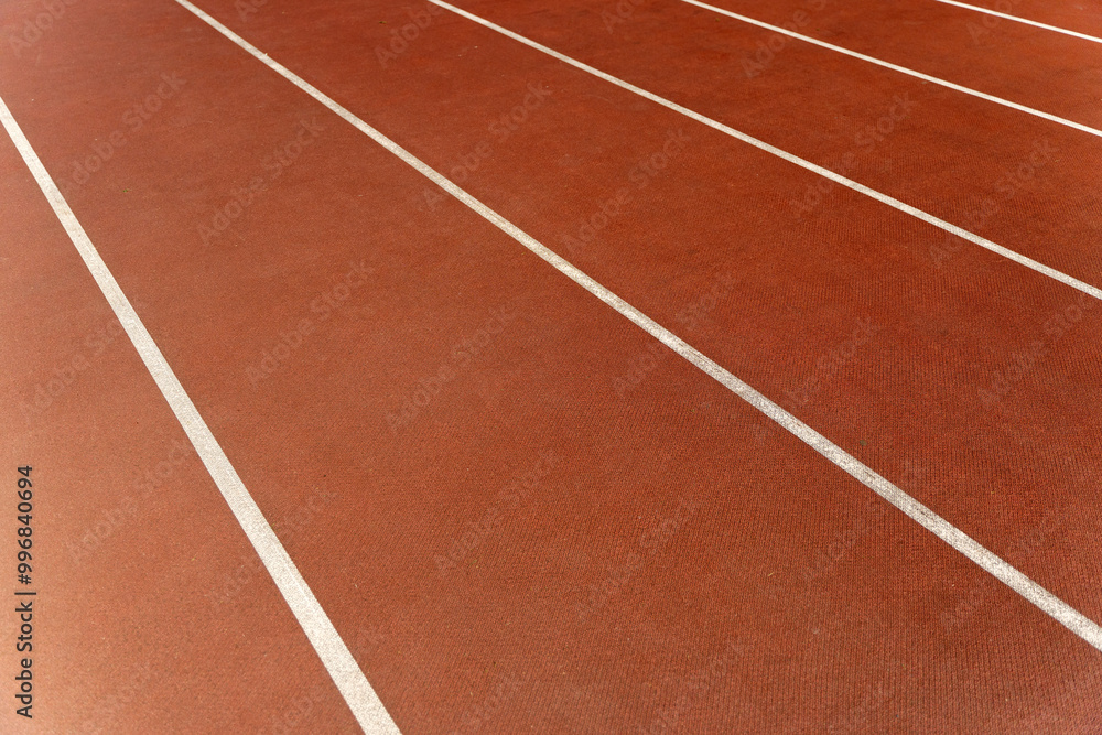 Fototapeta premium Run track stadium background. Start sport playground surface.