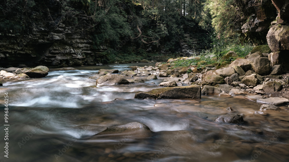 Rapid Waters Flowing Over Rocky Riverbed Rapid Waters Flowing Over Rocky Riverbed