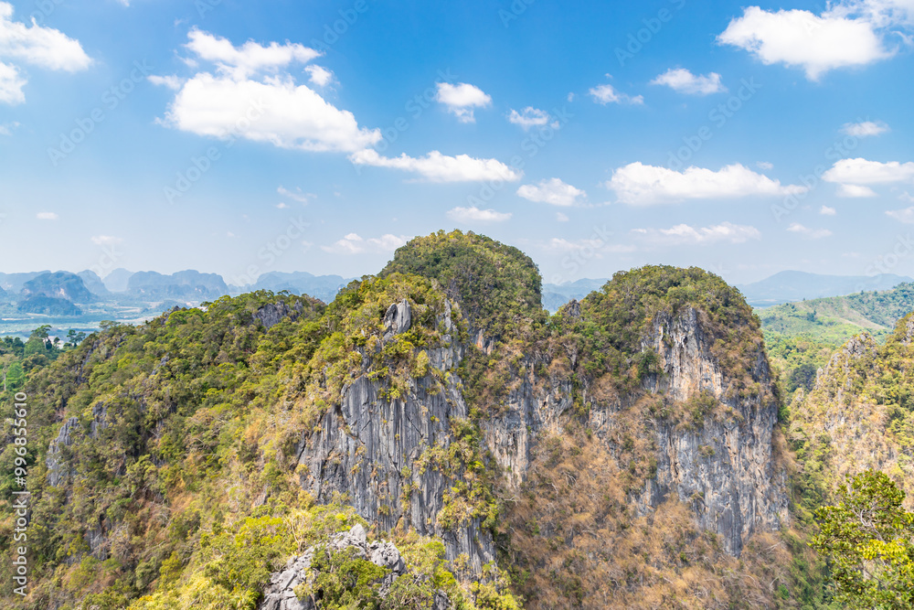 Aerial view from path to Wat Tham Suea The Tiger Cave temple well known temple on a hilltop in Krabi, Thailand. Aerial view from path to Wat Tham Suea The Tiger Cave temple well known temple on a hilltop in Krabi, Thailand.