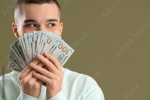 Young man with dollar bankn...