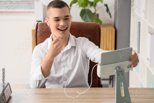 Young man with earphones an...