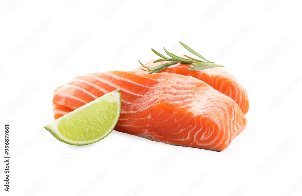 Pieces of fresh salmon, rosemary and lime isolated on white Pieces of fresh salmon, rosemary and lime isolated on white