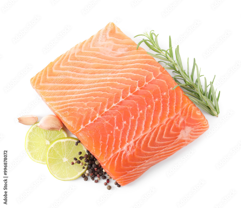 Piece of fresh salmon, lime and spices isolated on white, top view Piece of fresh salmon, lime and spices isolated on white, top view