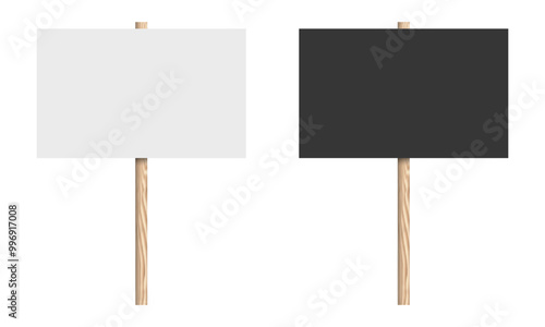 black and white protest sign boards with wooden post or handle