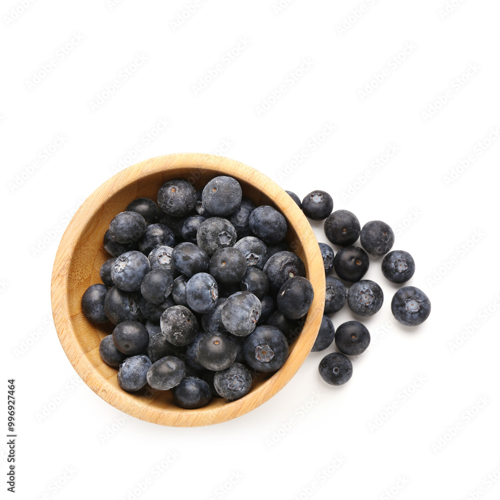 Wooden bowl with fresh blueberry on white background Wooden bowl with fresh blueberry on white background
