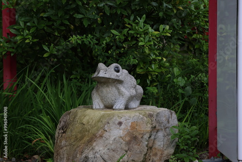 frog statue on the forest, grey frog 