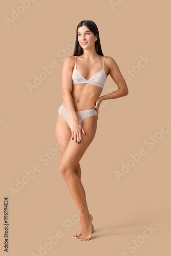 Young woman in underwear wi...