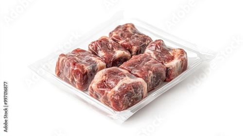 Oxtail in transparent packaging with a label, displayed on a white background, emphasizing the rich, flavorful cut for slow-cooking or stews.