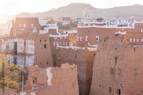 Traditional mud-brick houses in Dhahran al Janub, Saudi Arabia photo