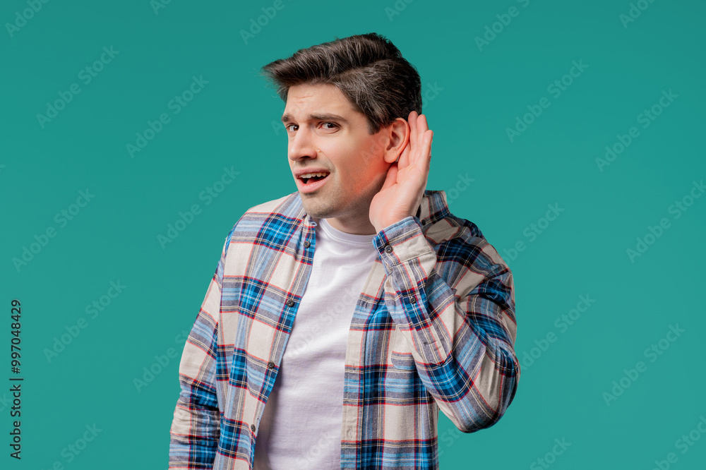 Curious 30s handsome man doesn't hear,asking what.Quiet sound,deaf,misunderstand Curious 30s handsome man doesn't hear,asking what.Quiet sound,deaf,misunderstand