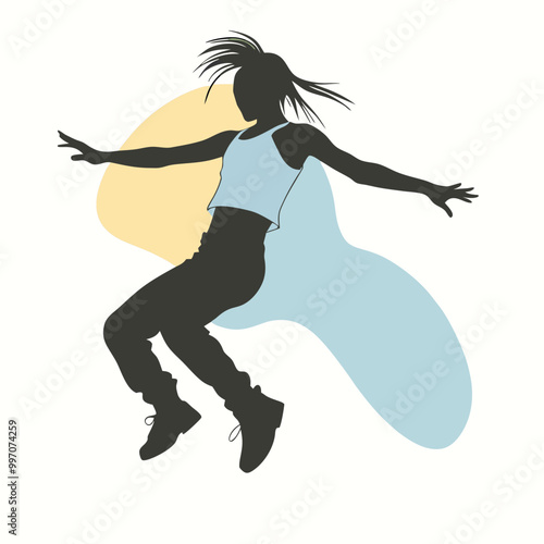 a black silhouette of a person in mid-air, with their arms stretched out to the sides. The person appears to be in the middle of a dance move,  