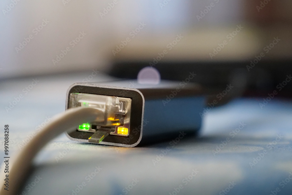 Ethernet cable adapter. Working ethernet cable adapter with green and yellow LED Ethernet cable adapter. Working ethernet cable adapter with green and yellow LED