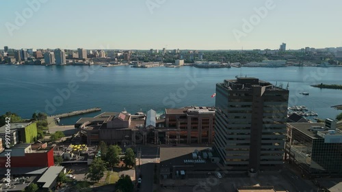 Watch As The Sun Sets Over Dartmouth Harbor And The Skyscrapers Of Halifax, Creating A Cinematic Drone Shot Full Of Golden Hues And Urban Beauty. Canada photo