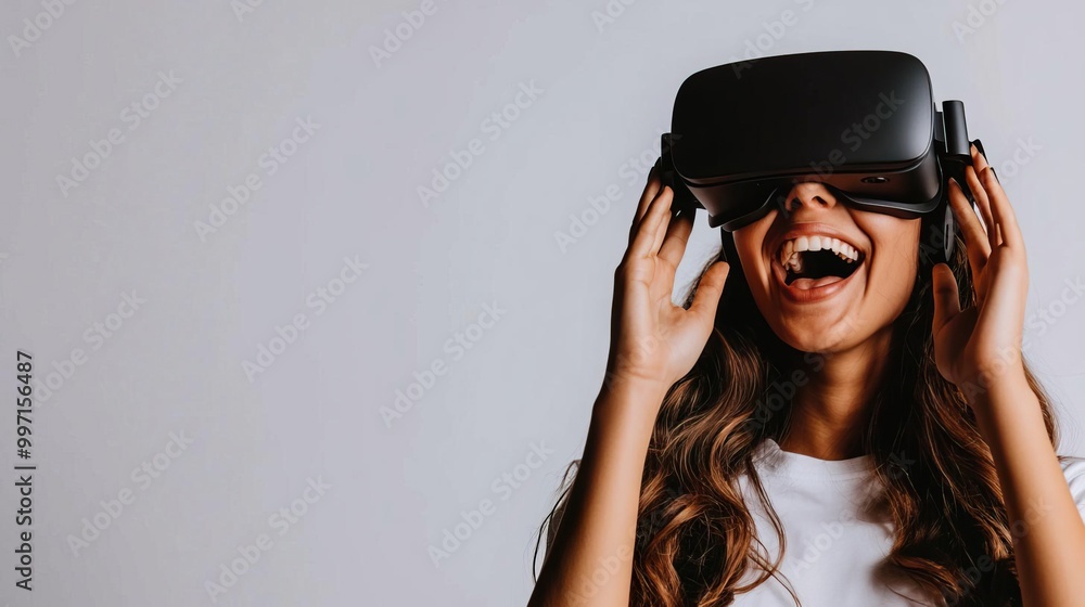 Excited woman wearing VR headset, experiencing virtual reality. Excited woman wearing VR headset, experiencing virtual reality.